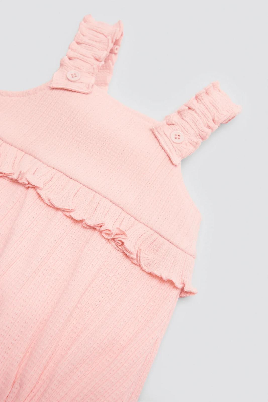 Peto bebé sin mangas detalle volante