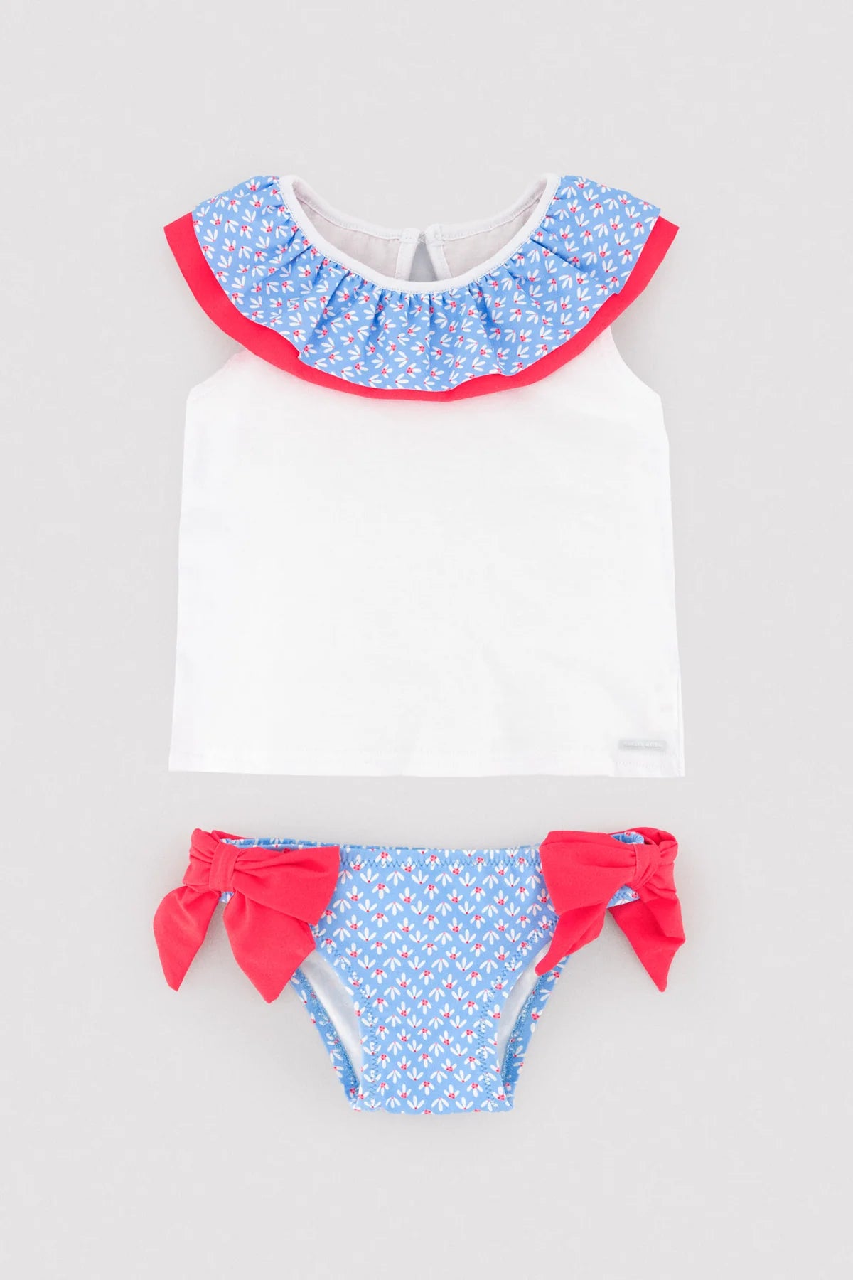 Conjunto bebé camiseta y braguita detalles volantes y lazos estampado flores