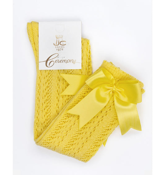 Calcetín alto hilo perle calado con lazo ‘Amarillo’
